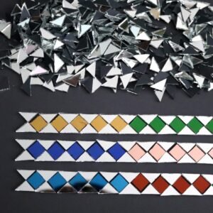 Mosaic colour mirror triangle shape approx 1 x 1 x 1.5 cm.